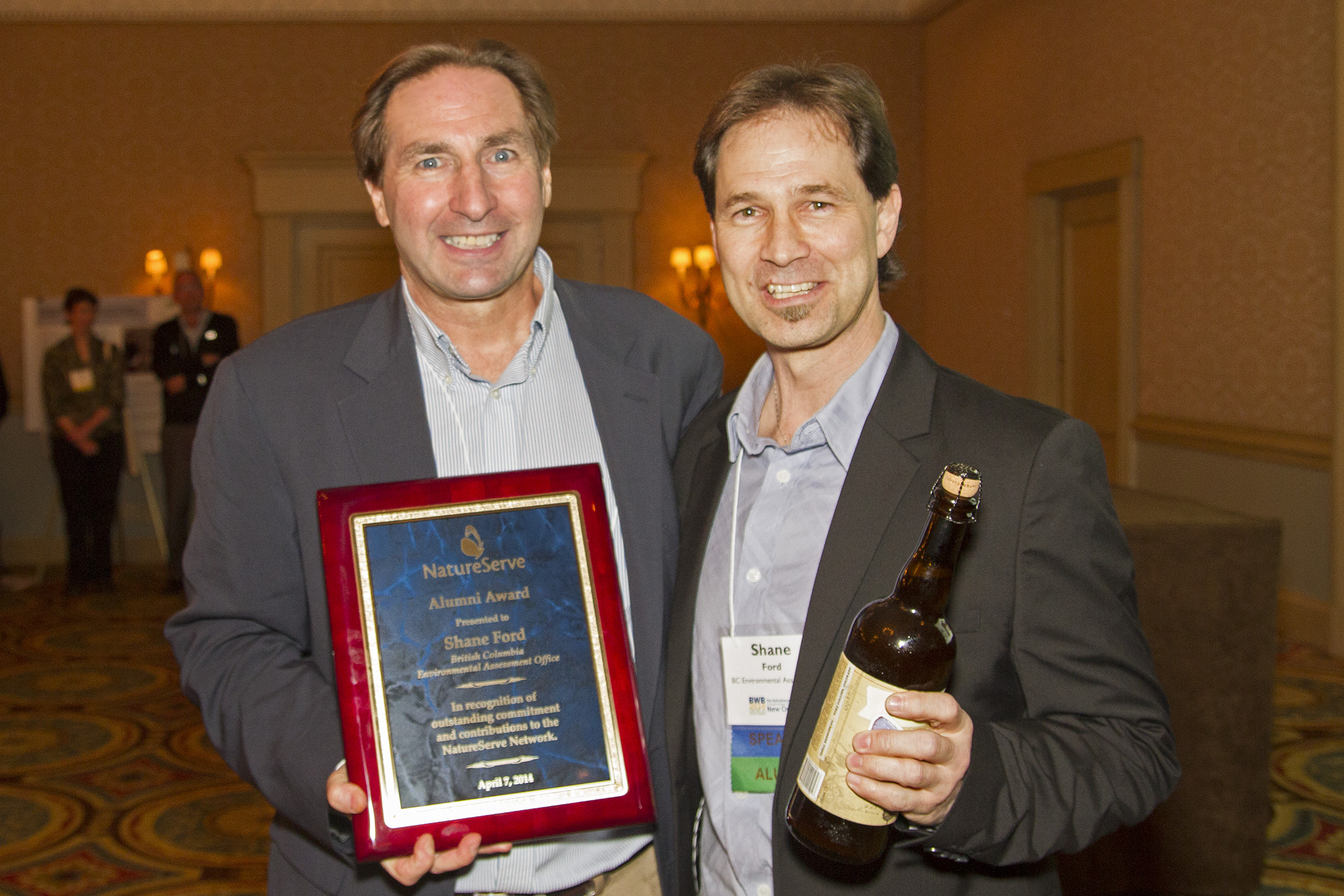 Shane Ford (right) receives the 2014 NatureServe Alumni Award from Don Kent, NatureServe's director of network relations.